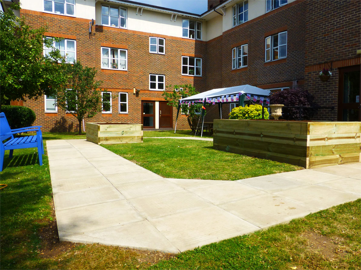 full view of garden from bottom level - steps, shed, lawn